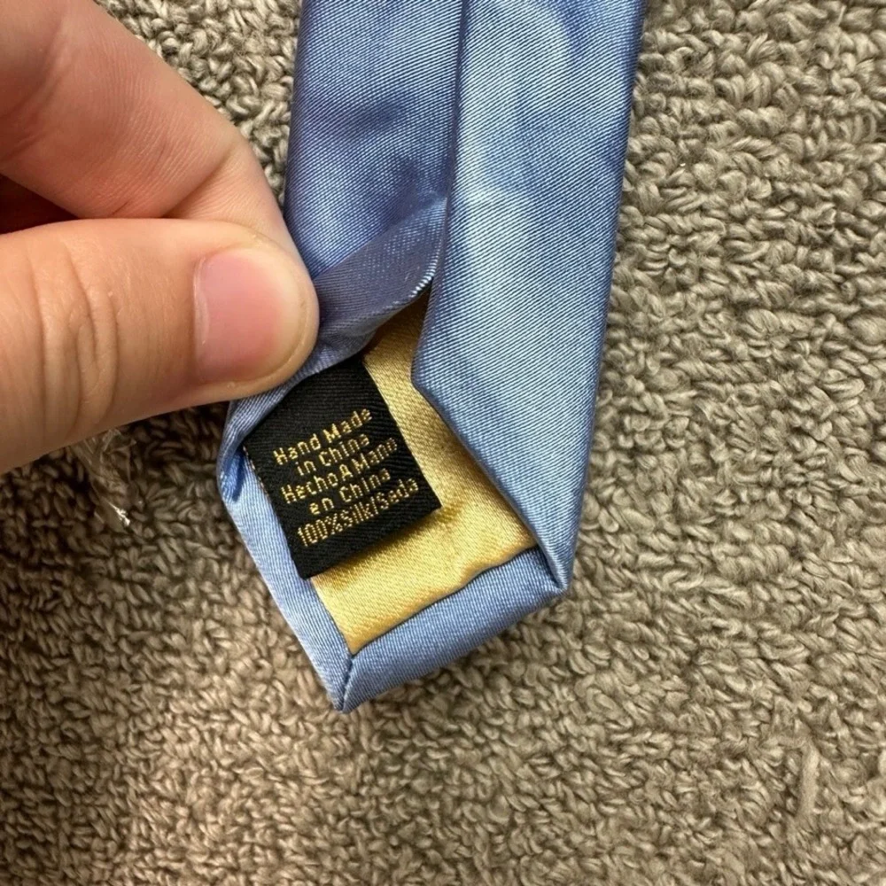 Donald J Trump Signature Collection Silk Tie Solid Light Blue Gold Crest Logo